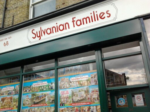 Sylvanian Families sign NGS New heritage branding, Sign Brand, Custom Typeface design, gilding, Hand painted signs, Murals, Nick Garrett London, retro vintage shop signs, sign shop sign London Traditional Signwriter, artist Nick Garrett London, Best London shop signage, Sign Costs, Painted Murals, Mission Statements for office walls, Facade letters, Best London shop signage, cafés, gilding leaf, Brand mission office statements, Best mural painters,