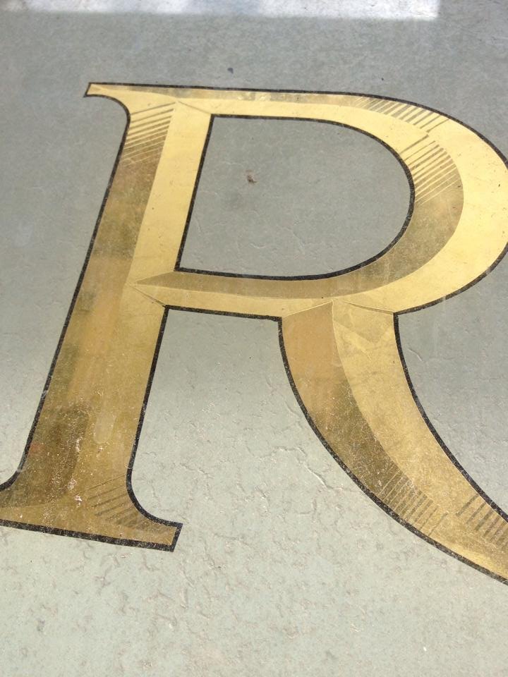NGS Roman Lettering sign writers, masters of the art. London Signs