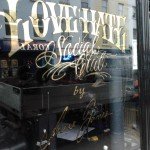 Love Hate's Cicano Script glass gilding London, Social Club gold letters glass