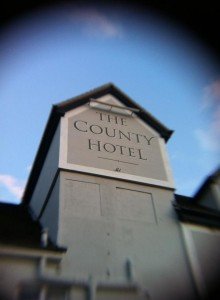 The County Hotel with border High level signage MEWP access specialists