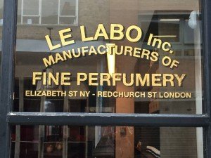 Aged gold leaf lettering NGS, Le Labo relic distress gilded windows.