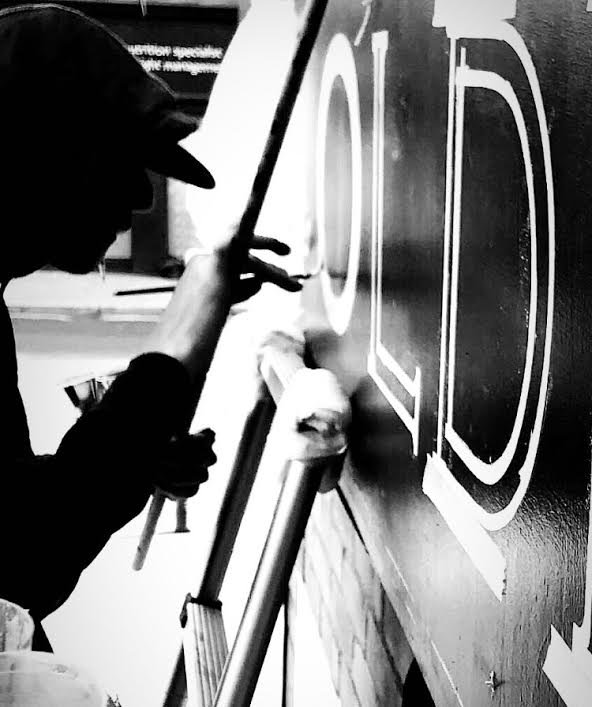 Stencilled letters murals architectural interior walls Nick Garrett sign writer London