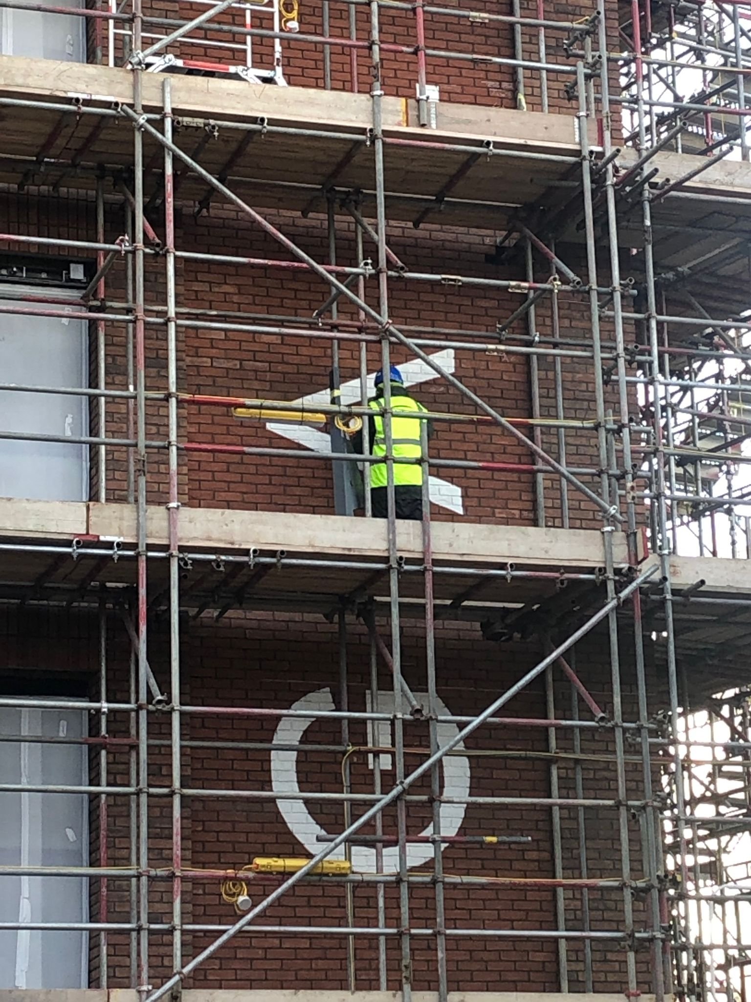Large wall painted signs Supergraphics XL Signs Murals. NGS London Large format signwriting specialists