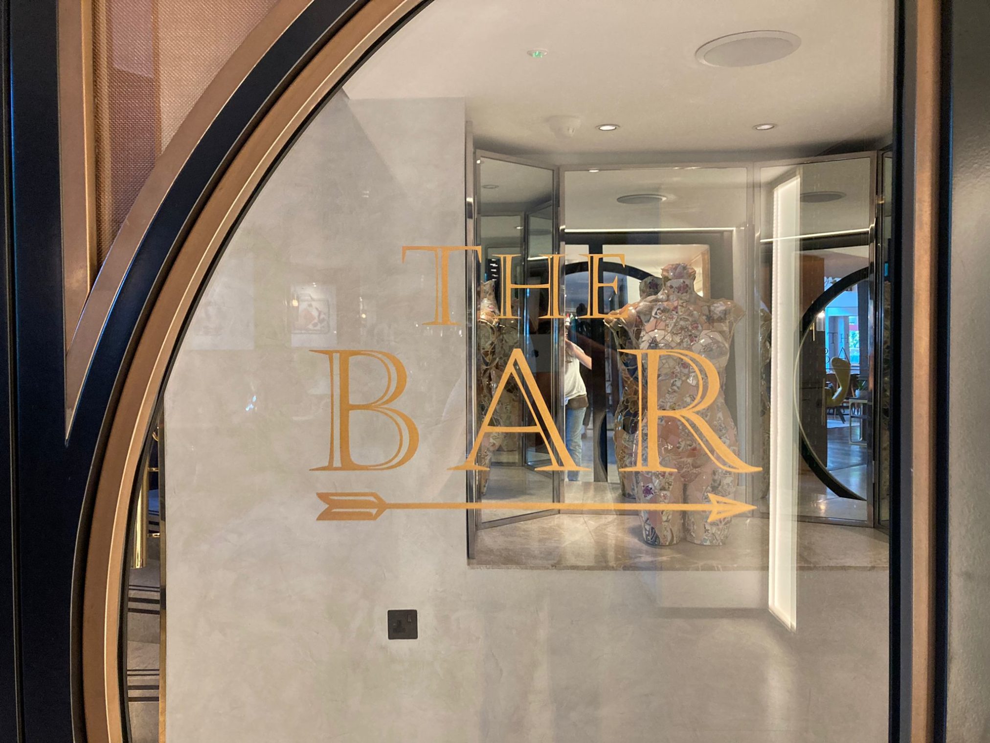 Signage specialists Athenium Hotel signs London. Flagship London Signwriting NGS