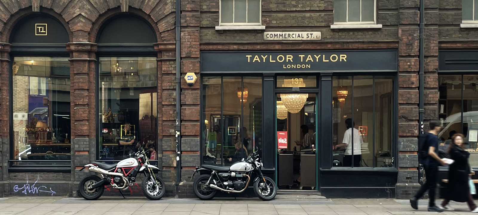 Traditional sign writing.London, Shop signage painted, Gold leaf glass works.