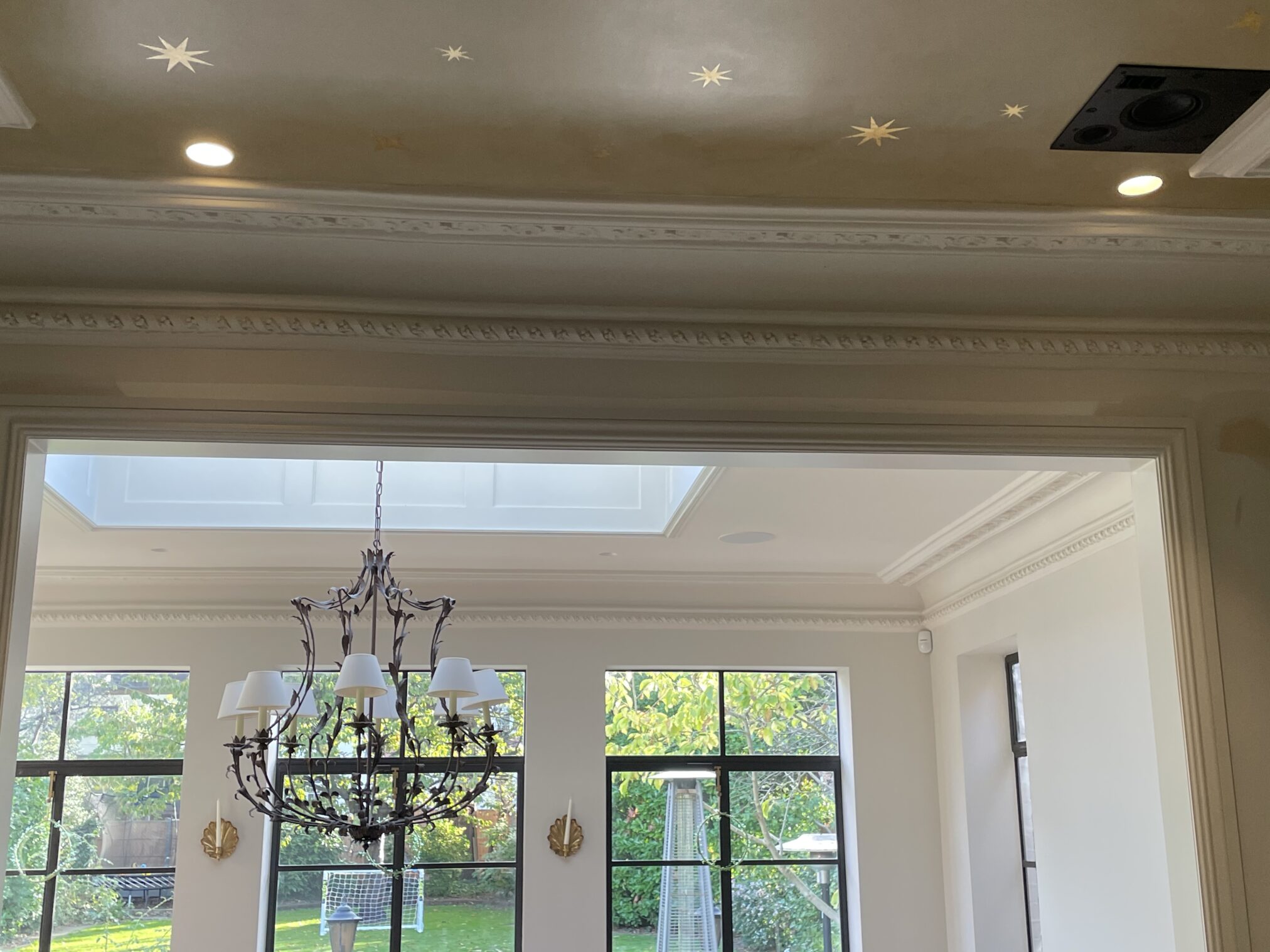 Gilded star ceilings feature walls artists, Nick and Seraina