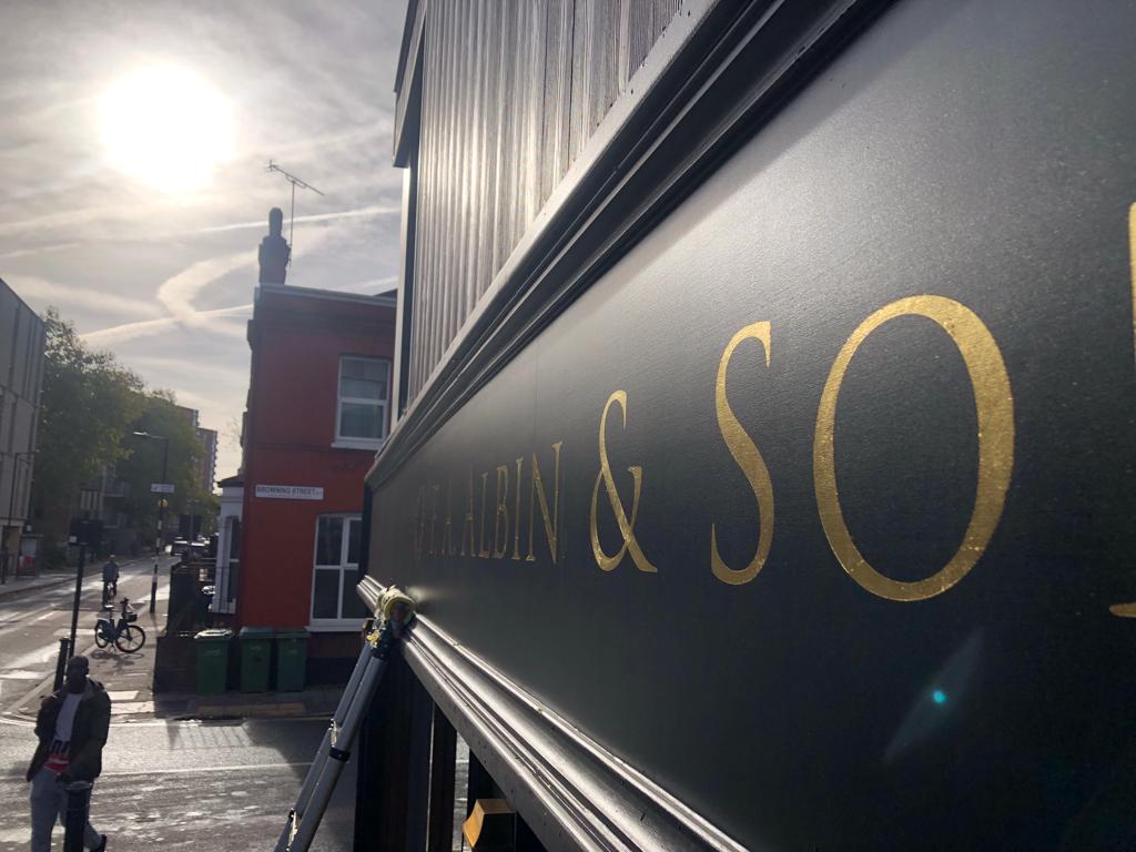 NGS Painted House Roman letters, NGS Retro Signs of London serif V&A-Cattich Roman Trajan Lettering, Vintage Lond fonts. Letter signwriting in Gold., bespoke-london-sign-writer-supergraphics-ghost-signs-office-wayfinding-gold-fanlight-numbers-and-hand-painted-house-numbers