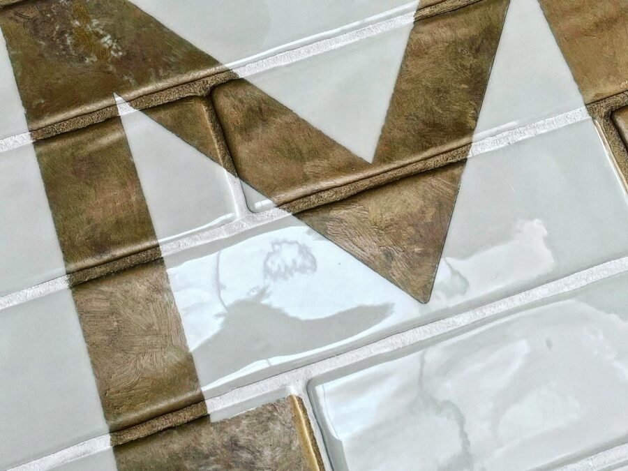 Moda-Hove-custom-sign-writing-by-NGS-bronzed-aged-wall-art-logo-detail