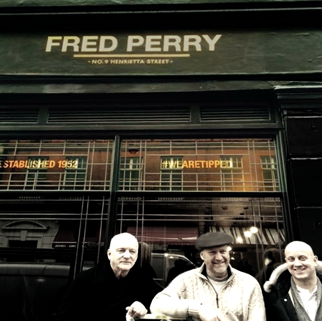 About Nick Garrett Artist Sign writer: renowned team page Team: Seraina and Nick, Gold leaf shop/store sign writing for Fred Perry London