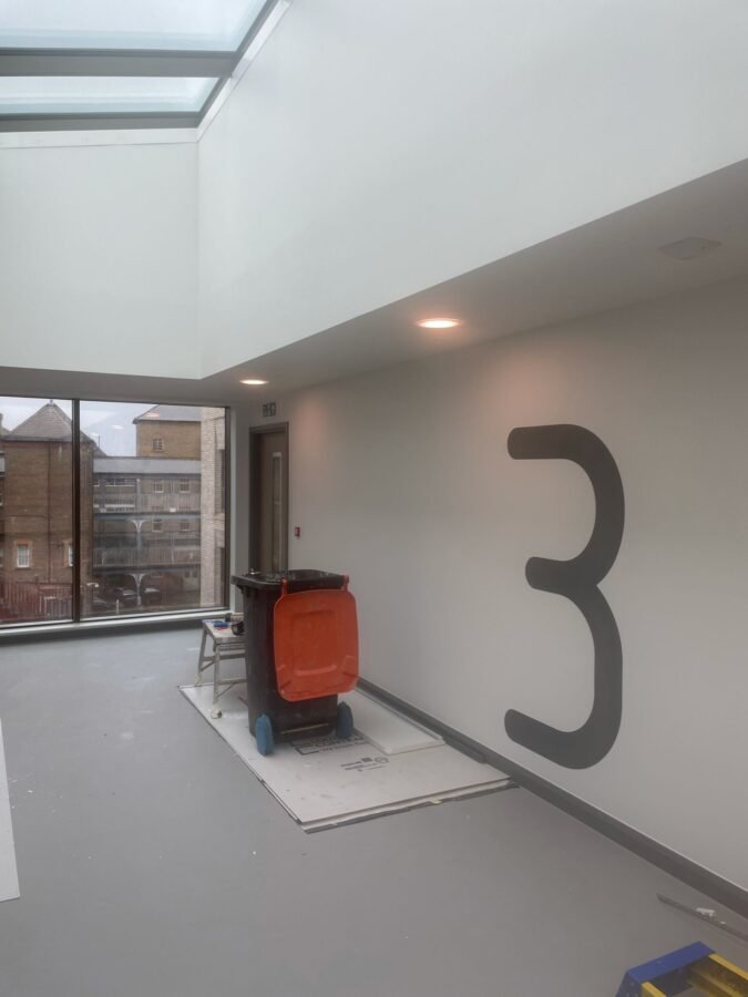 Lift reception lobby - signage Wayfinding Camden Mental Health Lift Lobby wall numbers