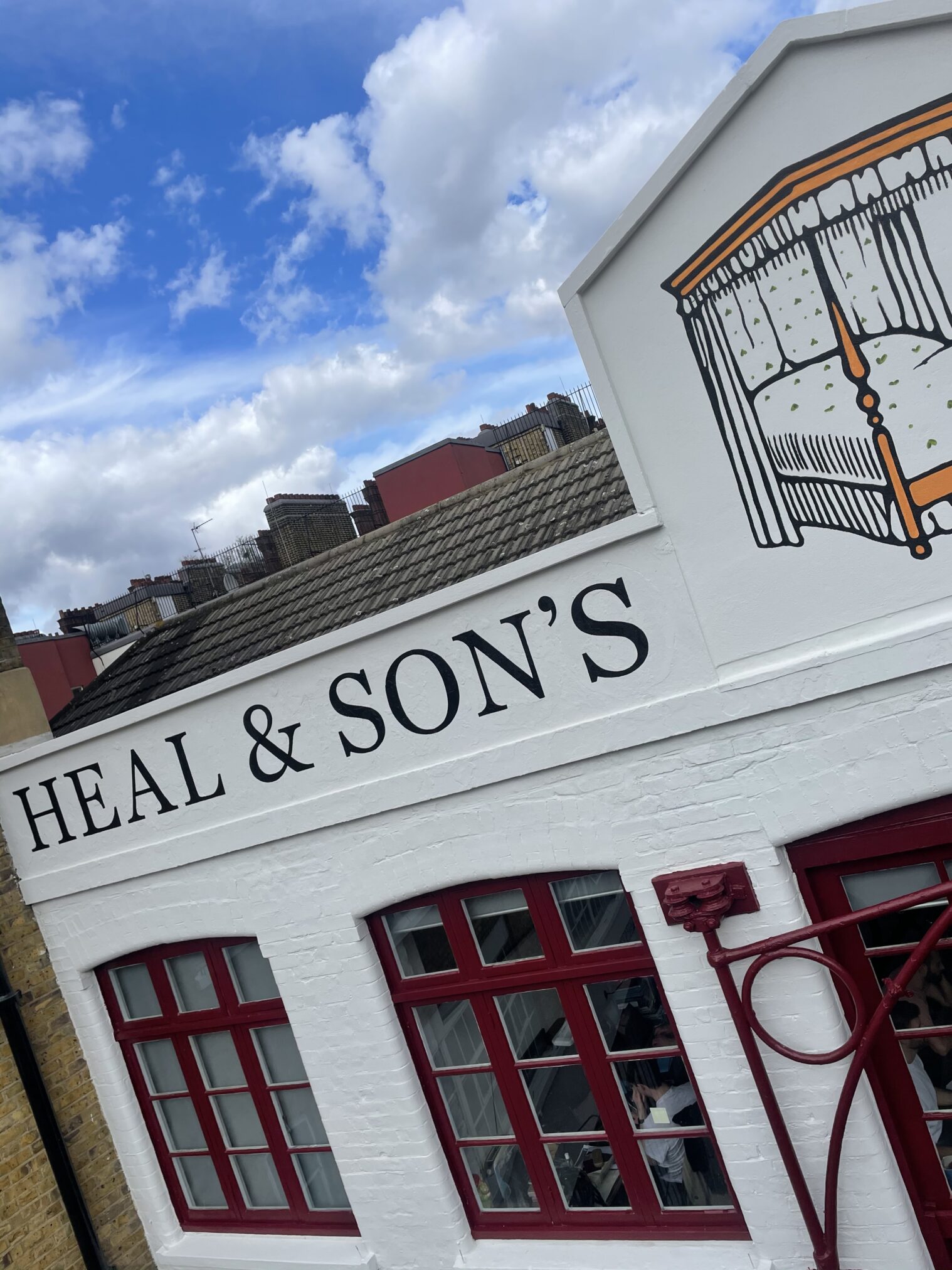 London Hand Painted Sign Writers NGS. Heal's London high level signage - scissor lift, cradle, mewp high level signage. NGS London