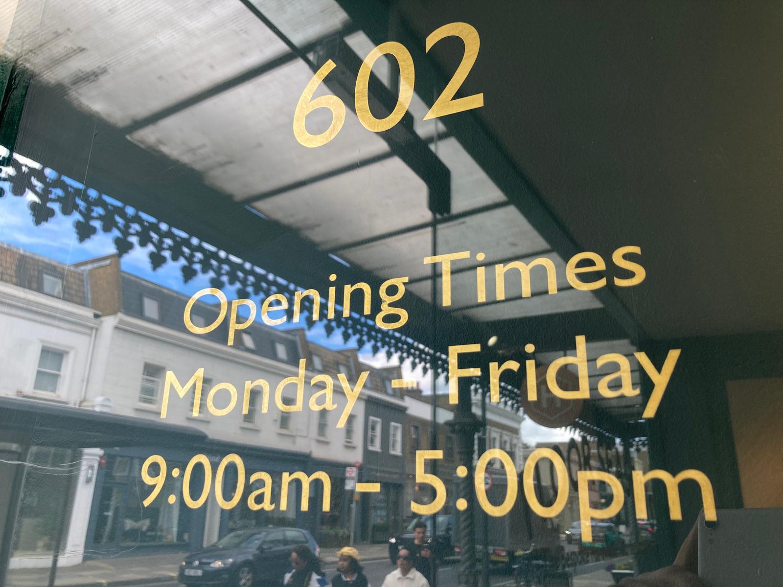 Hand painted signs in golden leaf/gilding