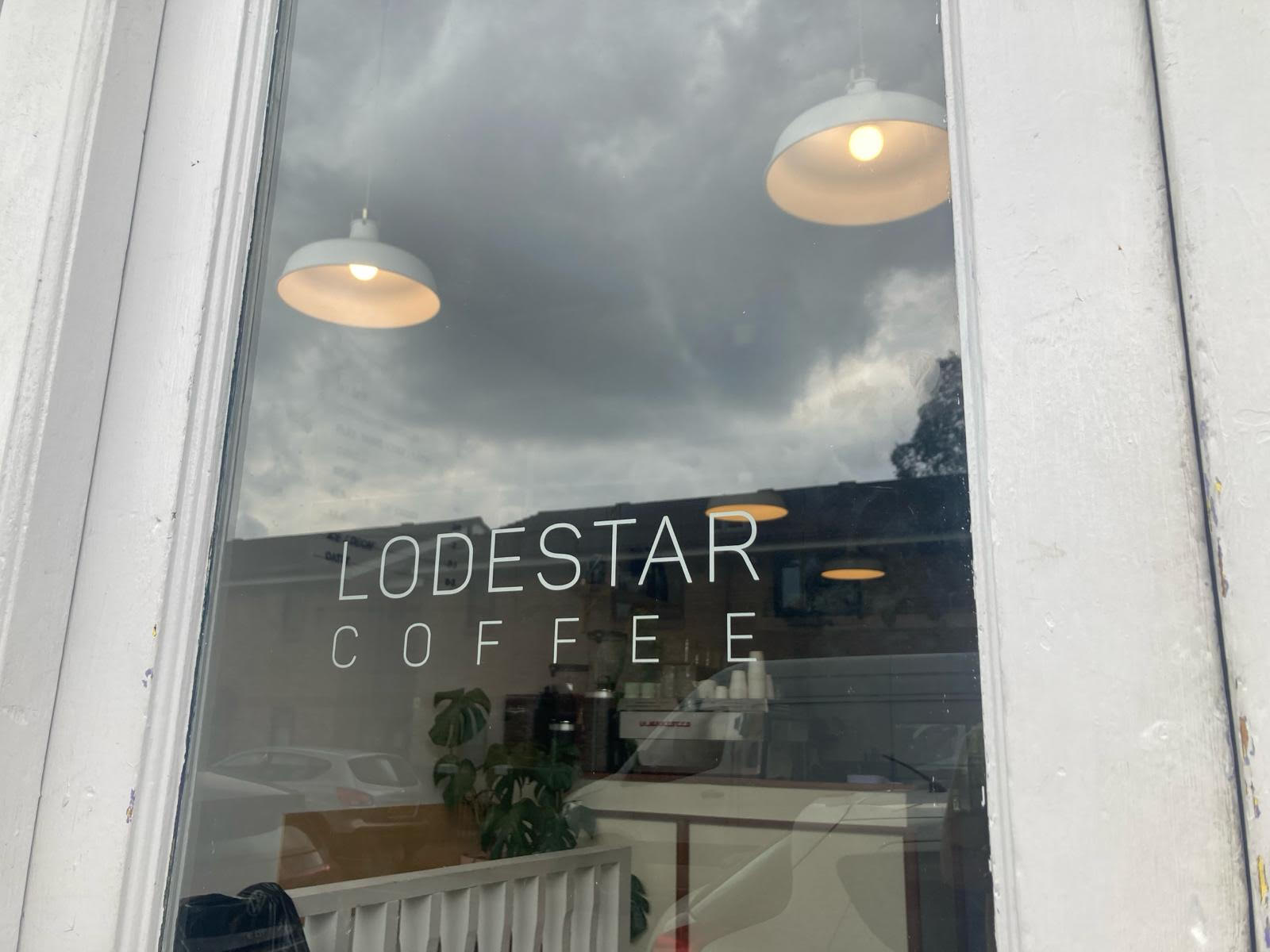 Cafe glass window sign writing for Lodestar of London