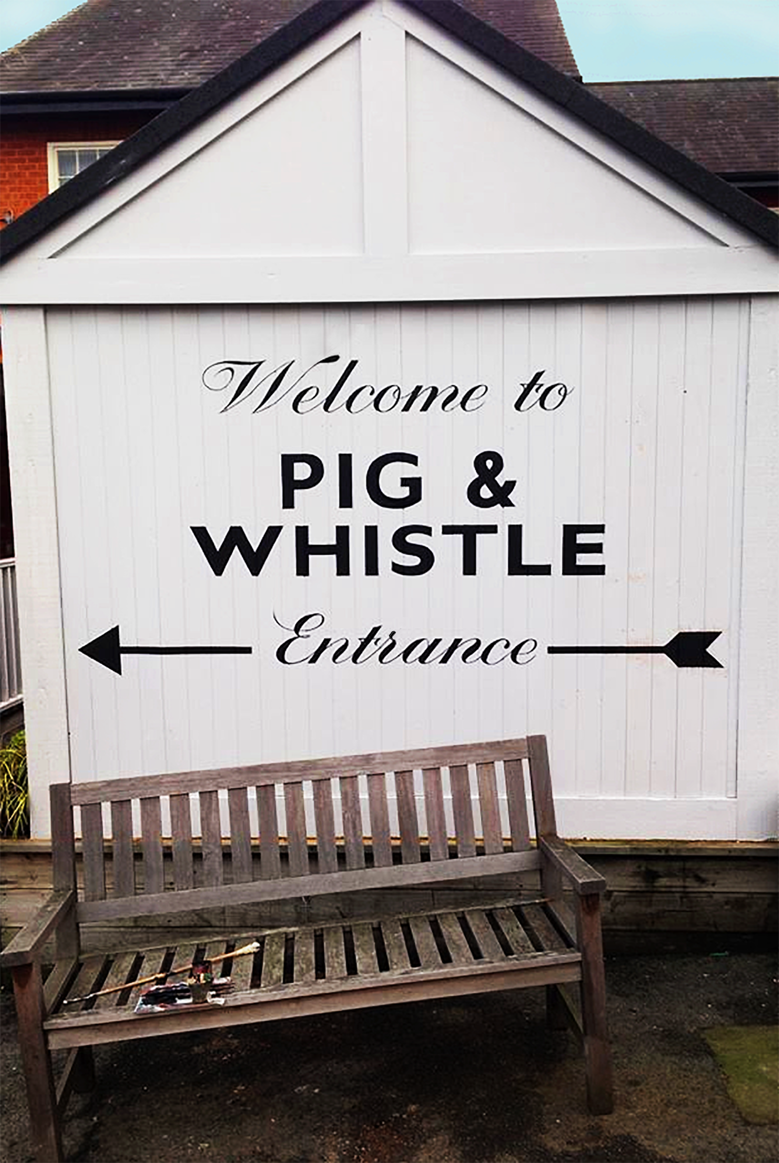 Traditional sign writers. NGS Pub signage.