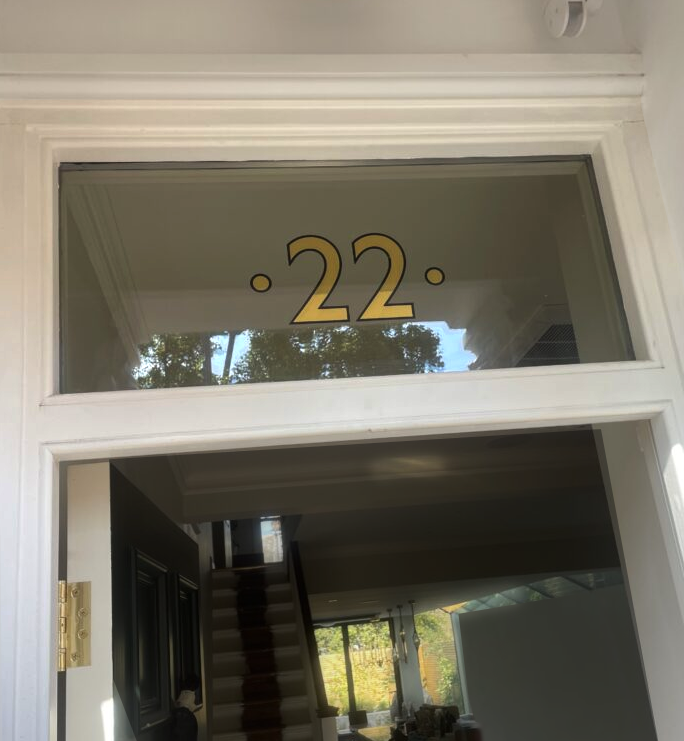Gold House Edward Johnston Numbers, Seraina Traditional Sign Writer, Mirrored Gold leaf on glass, house numbers painted, London.