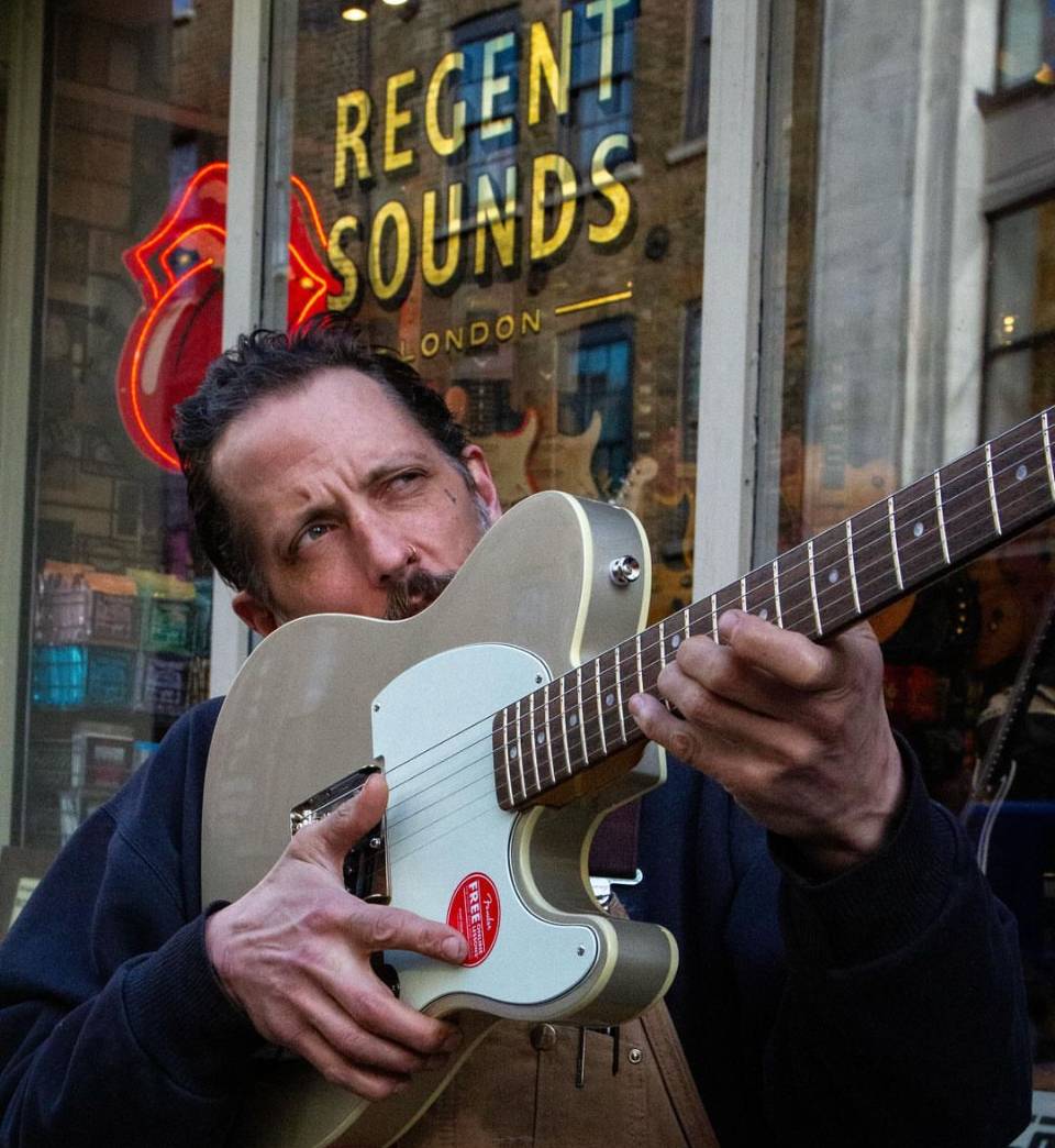Traditional Shop sign writing.London, Mary's Nightime 2