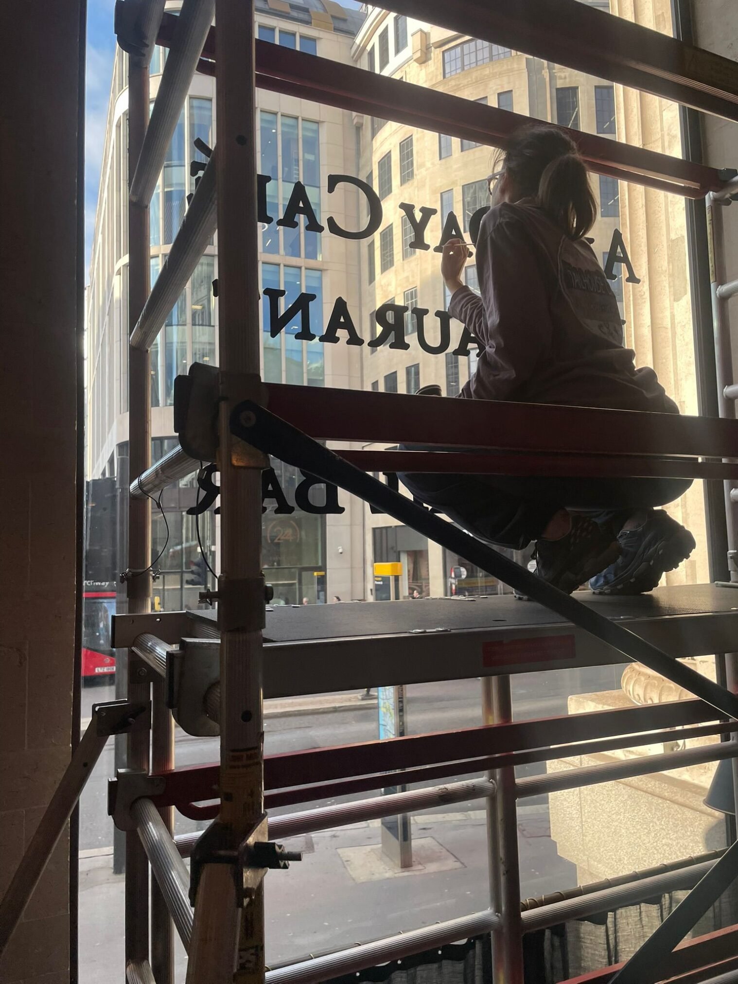 Seraina Sign writing the Wolseley City
