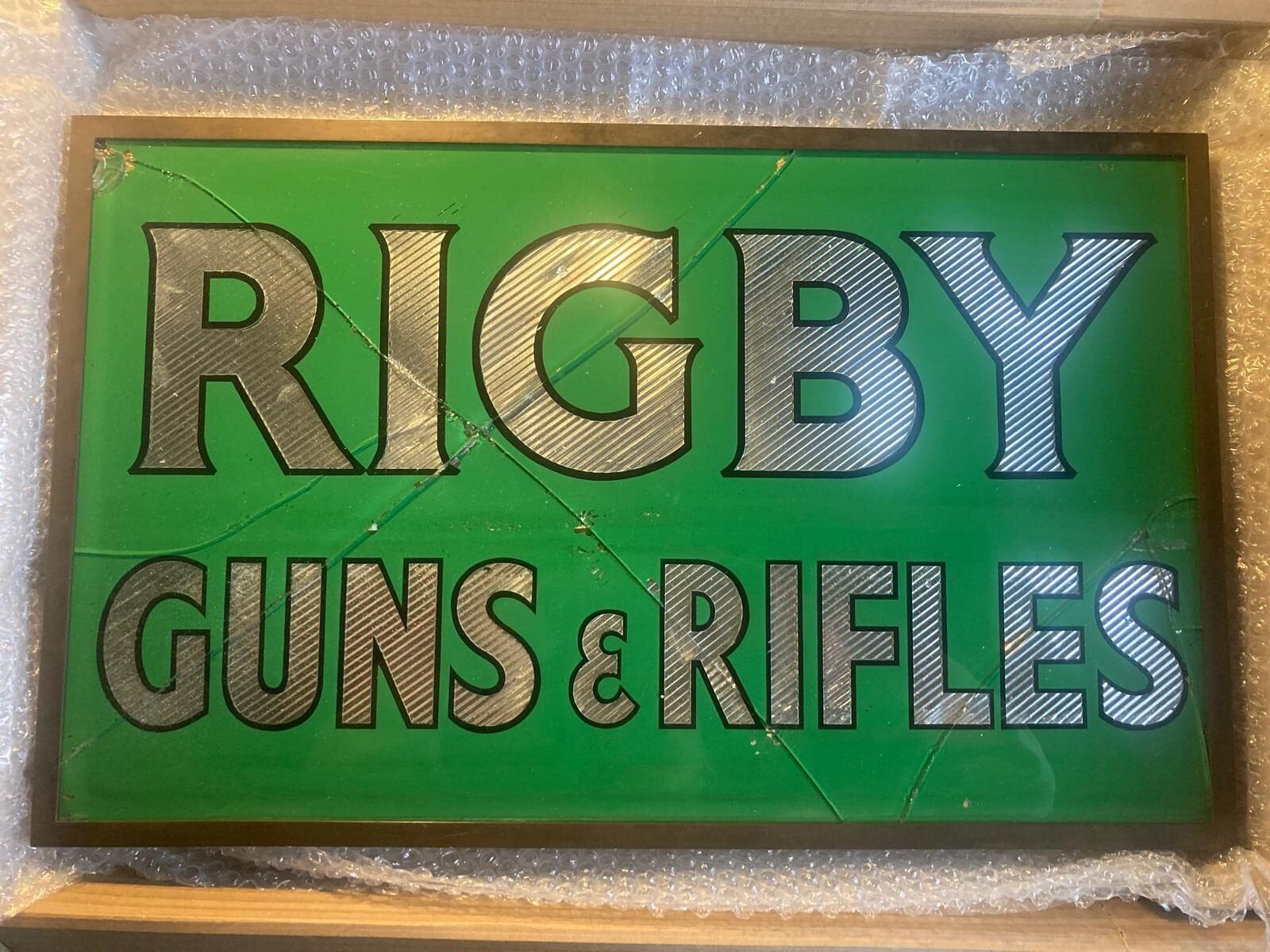 Case: Rigby Gun Makers - sign restoration. Rigby Guns makers restoration NGS signs