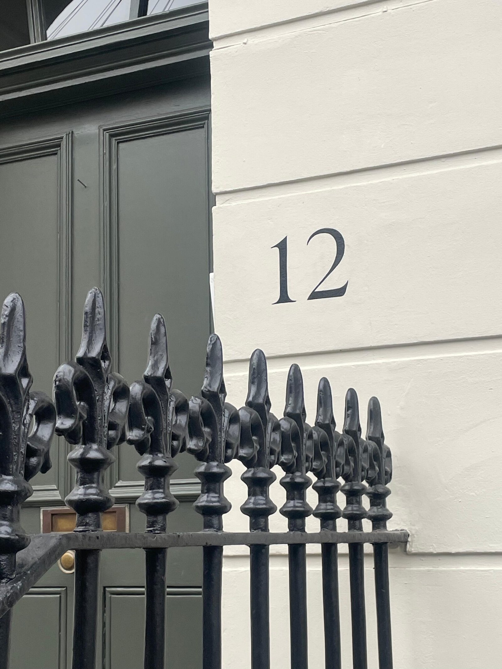 House numbers painted by hand on Pillars