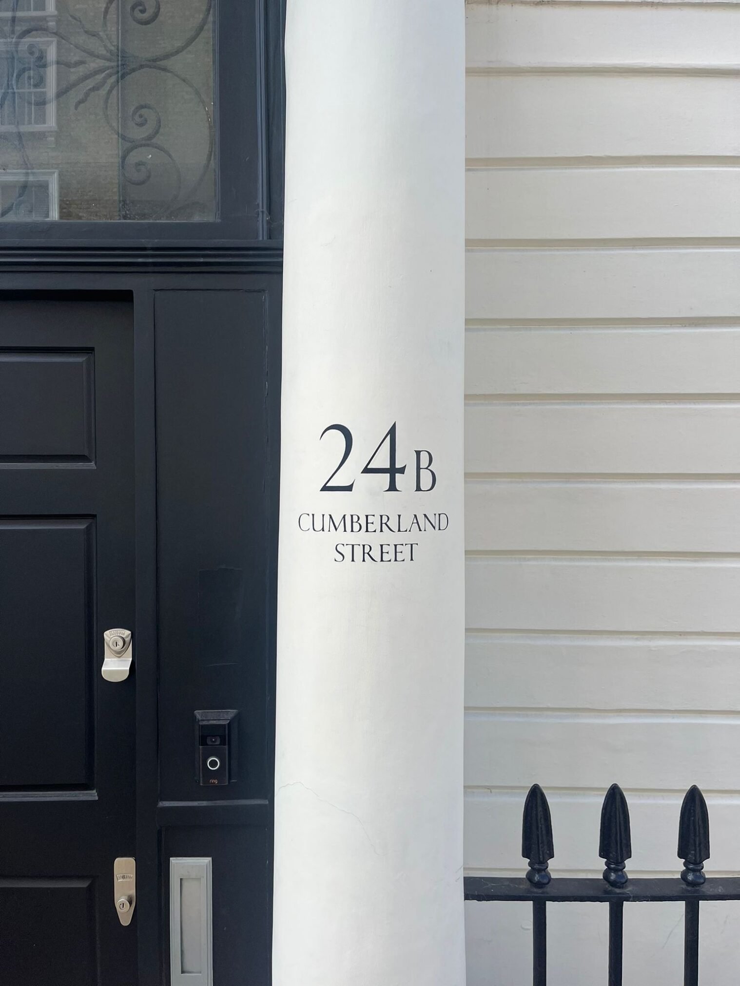 House numbers painted by hand on Pillars NGS London