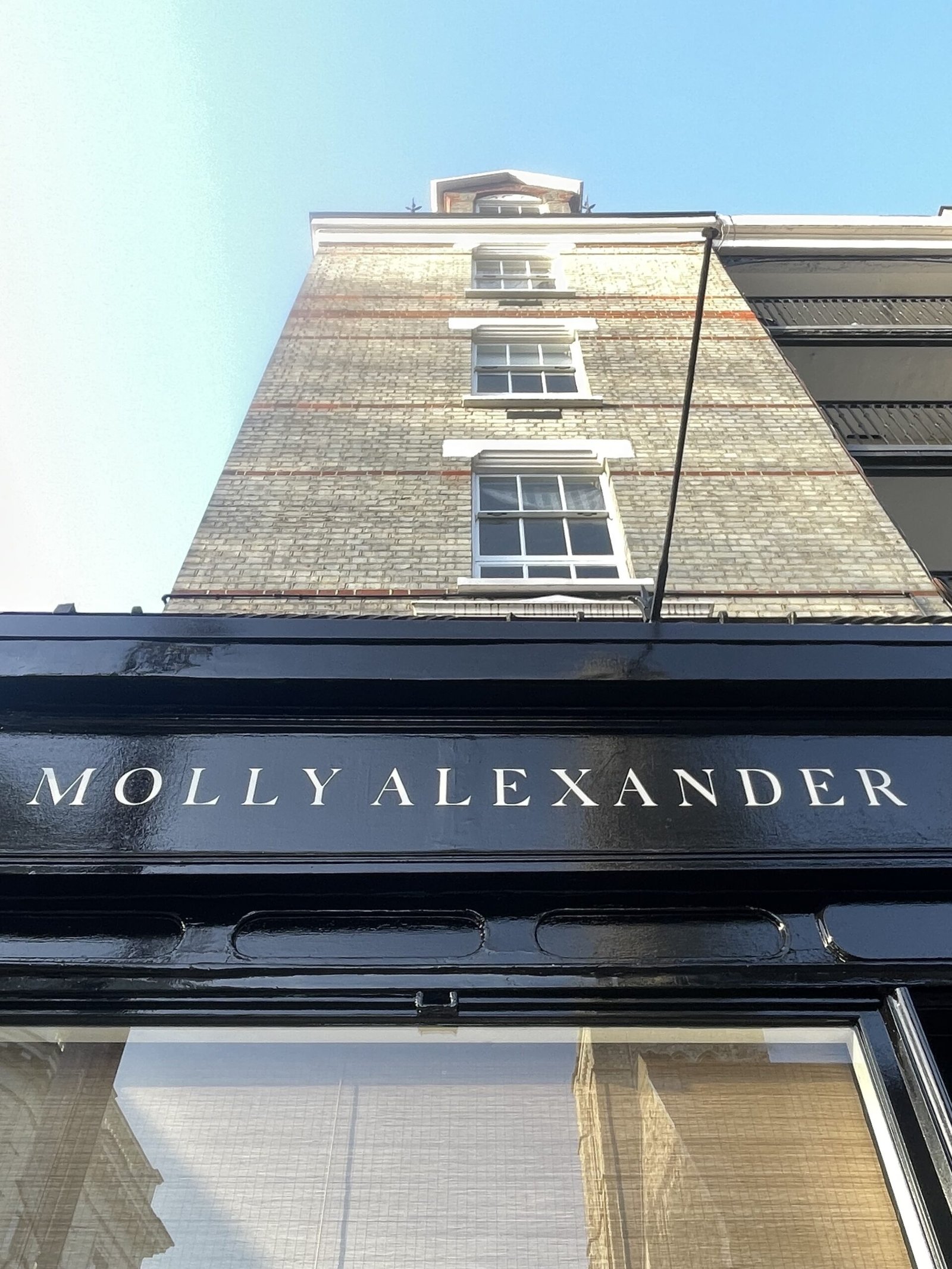 Traditional signs of London UK, Classic Roman lettering gold leaf NGS