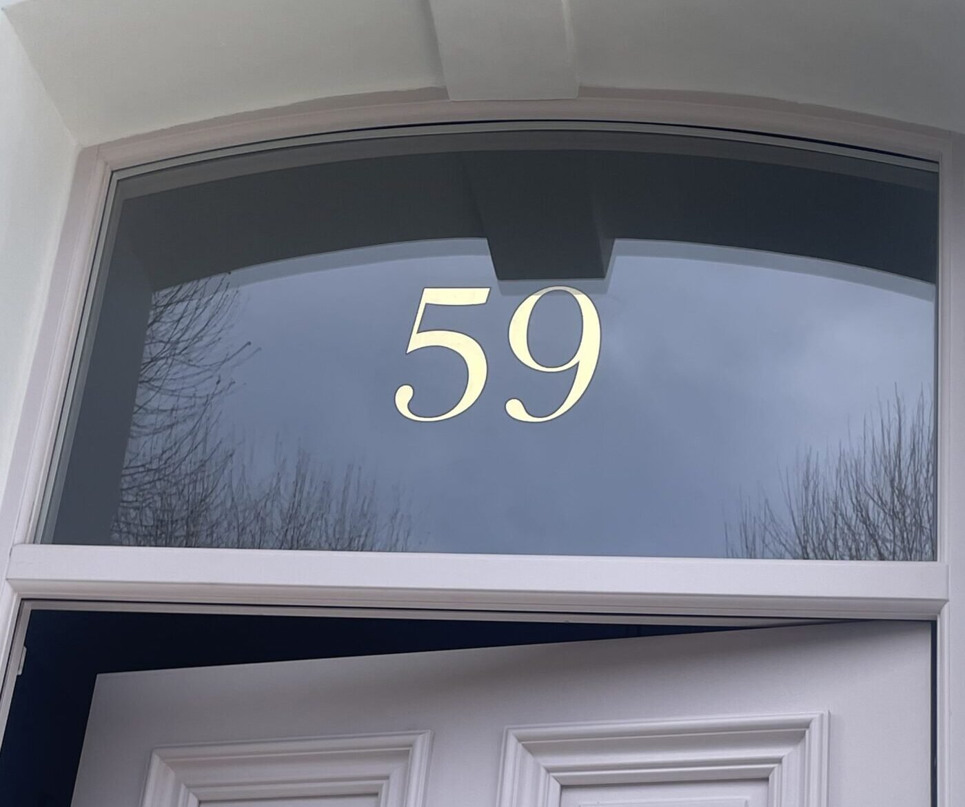 Gold Fanlight transom numbers, House numbers painted by hand on Fanlights NGS London