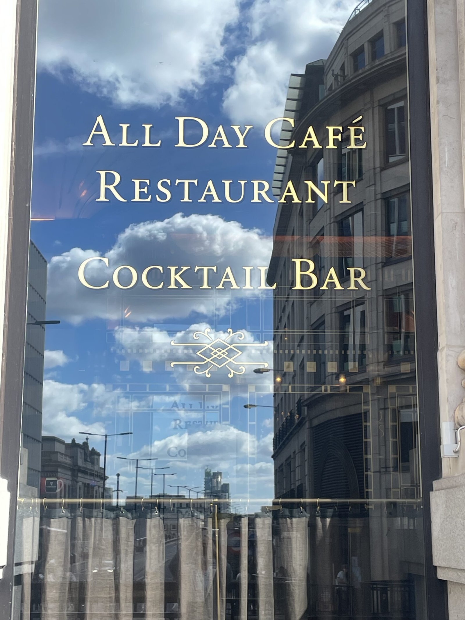 Front of The Wolseley City storefront with signwriting in gold by NGS , | NGS Sign lettering & writing. Front of The Wolseley City storefront with signwriting in gold by NGS ,