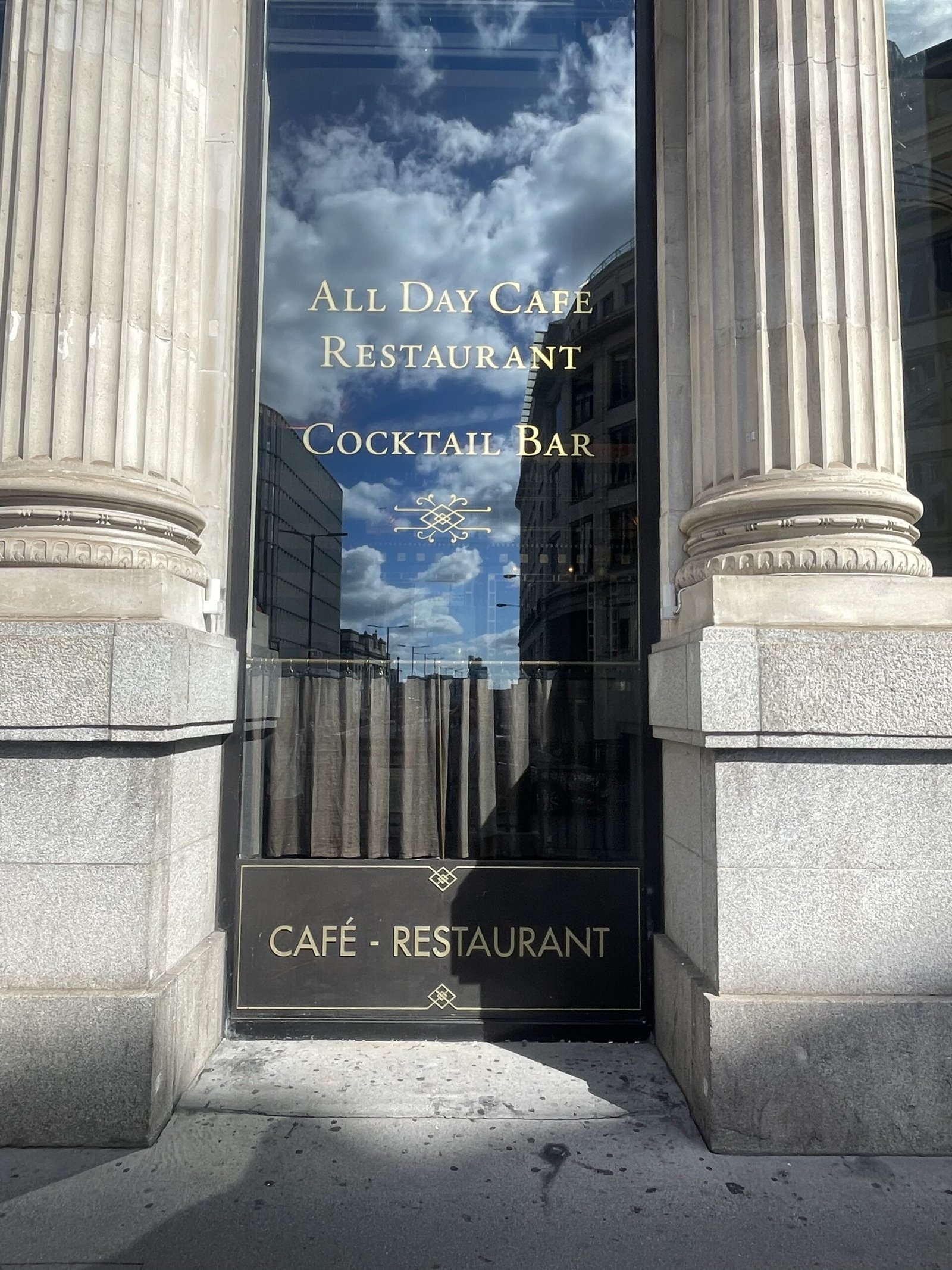 Front of The Wolseley City storefront with signwriting in gold by NGS , | NGS Sign lettering & writing. Front of The Wolseley City storefront with signwriting in gold by NGS ,